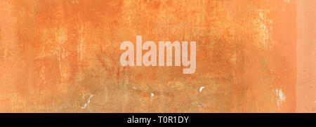 Yellow orange color, painted and faded wall texture grunge background, banner Stock Photo