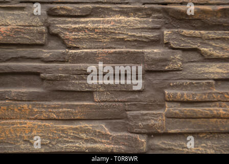 Seamless texture, background, stone lined with granite walls. sandstone. stone background wall. Facing Stone Stock Photo