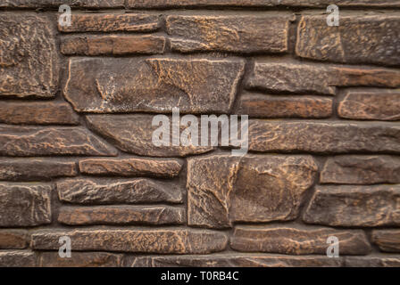 bronze textural background, granite walls. sandstone masonry stone Stock Photo