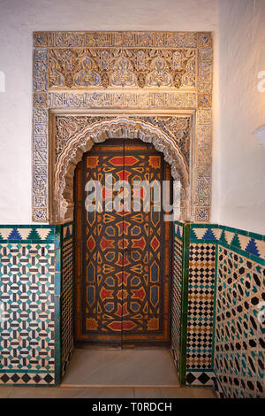 Arabesque Mudjar plasterwork and Zillige tiles of of the 12th century ) Alcazar of Seville, Seville, Spain Stock Photo