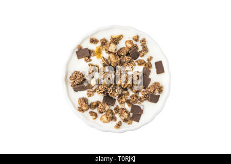 Bowl of Yogurt with Muesli and Chocolate Isolated on White Background, Top View Stock Photo