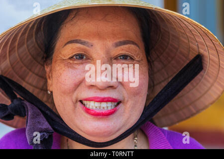 Vietnamese woman in a sampan  hat, Hoi An, Vietnam, Asia Stock Photo