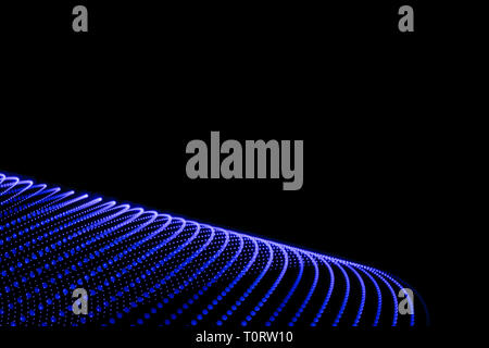 Beautiful lines of blue colors. Abstract figure of bluish lights on black background. Stock Photo