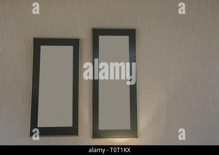 Two Blank frames on the wall, space for text Stock Photo