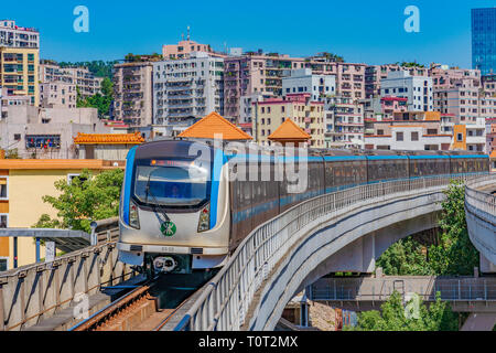 SHENZHEN, CHINA - OCTOBER 29: Overground train arriving at a