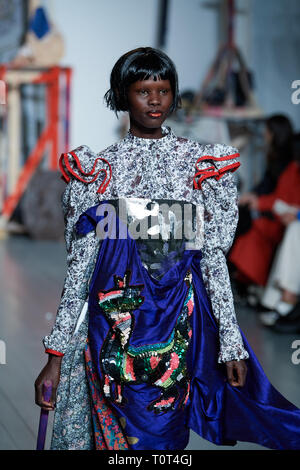 Model on the catwalk during the Matty Bovan show during LFW AW19 held at the BFC Show Space, 180 Strand, WC2R 1EA Stock Photo