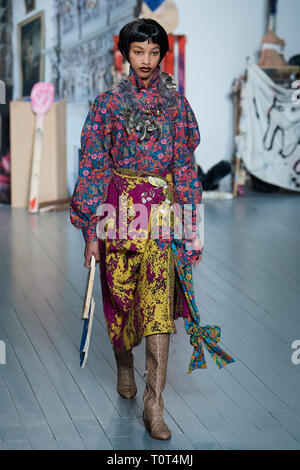 Model on the catwalk during the Matty Bovan show during LFW AW19 held at the BFC Show Space, 180 Strand, WC2R 1EA Stock Photo