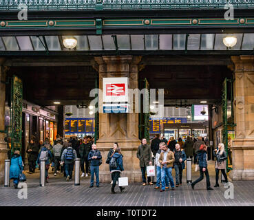 Commuters walking by Victorian entrance of Glasgow Central Station, Scotland, UK Stock Photo