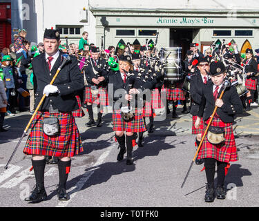 pipes and drum band marching in saint Patrick's day parade Stock Photo