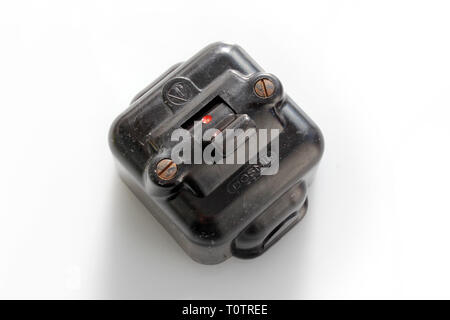 Antique switch on off bakelite, isolated on white background, closeup Stock Photo