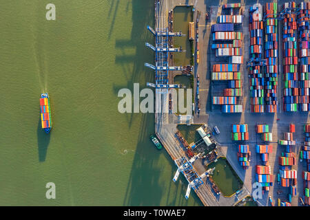 Top view aerial of Cat Lai port container, Ho Chi Minh City with development buildings, transportation, energy power infrastructure. Vietnam Stock Photo