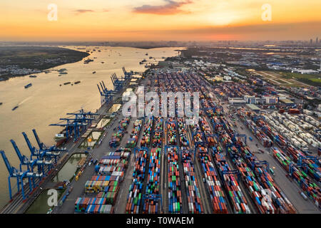 Top view aerial of Cat Lai port container, Ho Chi Minh City with development buildings, transportation, energy power infrastructure. Vietnam Stock Photo