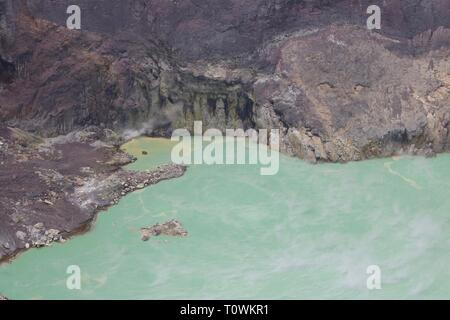 View of the sulphur lake in the crater of the Santa Ana volcano in El Salvador Stock Photo