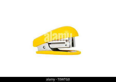 Yellow colored stapler closeup on white background 2019 Stock Photo