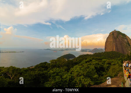 Tourists visiting the beautiful Sugar Loaf Mountain in Rio de Janeiro Stock Photo