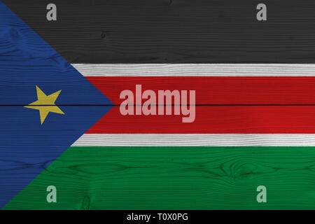 South Sudan flag painted on old wood plank Stock Photo