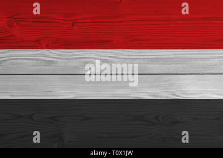 yemen flag painted on old wood plank Stock Photo