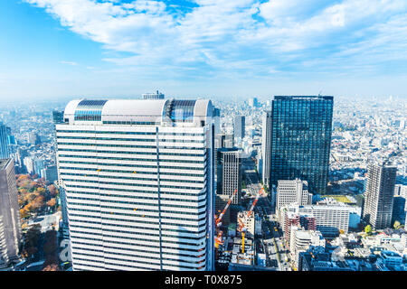 Asia Business concept for real estate and corporate construction - panoramic modern city skyline aerial view of Shinjuku area under blue sky in Tokyo, Stock Photo