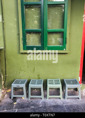 Chairs of coffee shop on the street in Hanoi, Vietnam. Stock Photo