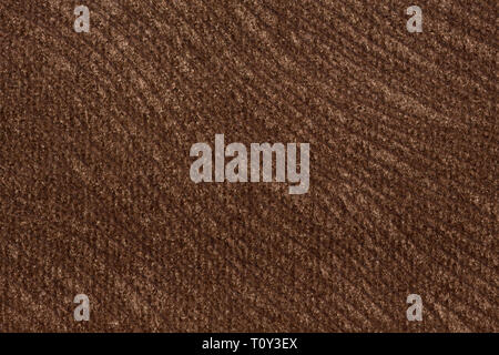 Contrast textile background in effective brown hue. Stock Photo