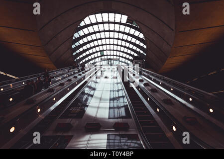 LONDON - MARCH 20, 2019: Escalator stairs interior at Canary Wharf in London Stock Photo