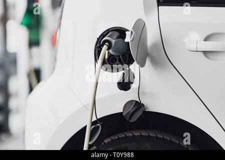 Electric car charging Stock Photo