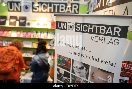 Leipzig, Germany. 22nd Mar, 2019. Two visitors to the Leipzig Book Fair are standing at the stand of the publishing house Unsichtbar. The Book Fair will continue until 24.03.2019. Credit: Jan Woitas/dpa-Zentralbild/dpa/Alamy Live News Stock Photo