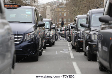 London, UK. 22nd Mar 2019. A taxi protest is currrently taking place at Westminster and has brought traffic to a standstill in a number of streets. In particular, the drivers are protesting against Sadiq Kahn's plans to ban taxis from certain roads in the capital. Credit: Clearpix/Alamy Live News Stock Photo