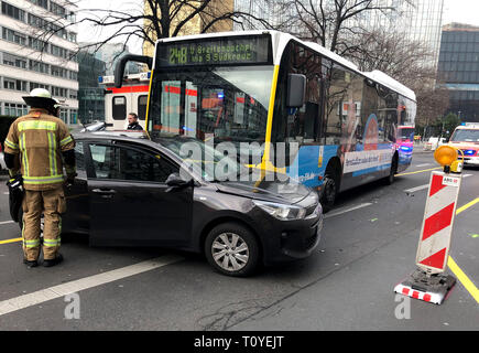 Berlin, Germany. 22nd Mar, 2019. A car and a bus are on the road after an accident. A bus driver lost control of his car in Berlin-Kreuzberg for health reasons. The bus crashed into a car. Credit: Taylan Gökalp/dpa/Alamy Live News Stock Photo