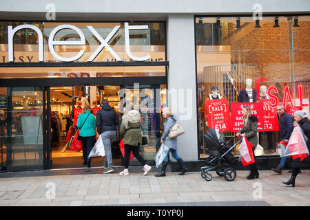 Queues of shoppers in Preston, Lancashire, UK. 23rd March, 2019. Next mid-season spring sale. The Next sale is a retail legend, with hundreds of shoppers up and down the country flocking to stores, and on-line to grab some clearance bargains. Stock Photo