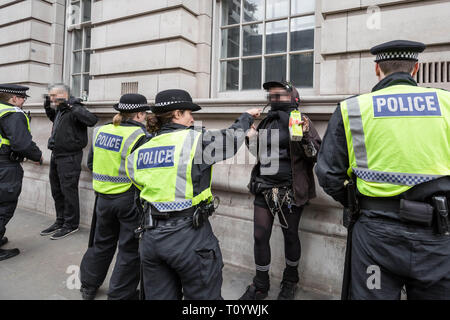 London, UK. 1st April, 2017. Anti-Fascist groups including Unite Against Fascism (UAF) clash with police with some arrests being made whilst counter-protesting far-right British nationalist groups including Britain First and the English Defence League (EDL) during their “march against terrorism” through central London in light of the recent terror attacks in Westminster. Police arrested 14 people during the clashes. Credit: Guy Corbishley/Alamy Live News Stock Photo