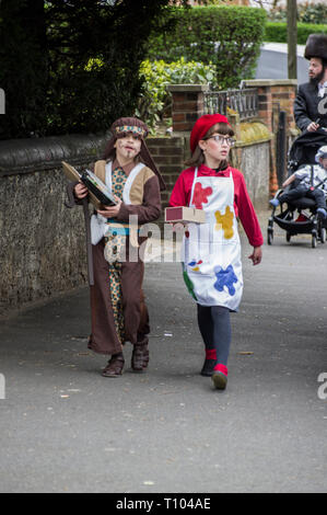 Two Jewish children in fancy dress for the Purim holiday, one in a shepherd costume the other dressed as an artist in Stamford Hill London Stock Photo