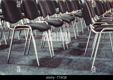 Row of chairs in boardroom. Stock Photo