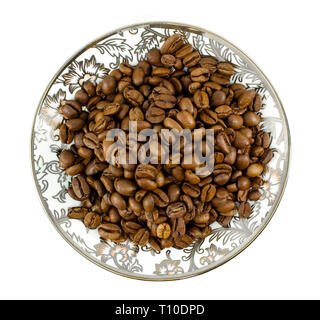 Brown coffee beans on plate with oriental pattern. Top view flat lay. Isolated on white background. Stock Photo