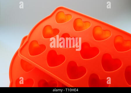 closeup of silicone ice molds in the form of hearts Stock Photo