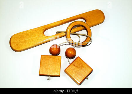 brain teaser wood puzzle on white background Stock Photo