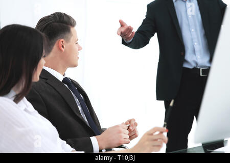 colleagues discussing new ideas in the office Stock Photo