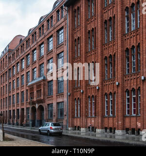 Berlin-Friedrichshain.Plus Hotel & Hostel in historic red-brick early twentieth century building by architect Ludwig Hoffmann and old factory building Stock Photo