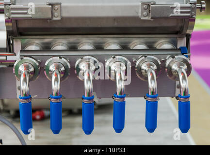 switches to empty conveyor belt for bread factory. selective focus. Stock Photo