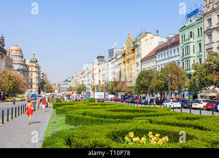 People walking down the wide boulevard known as Wenceslas square prague CZECH REPLUBLIC EU EUROPE Stock Photo