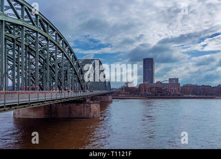 View of the old Hohenzollern Bridge and the beautiful long river Rhine in Cologne Germany in 2019. Stock Photo