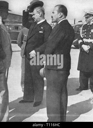 Nazism / National Socialism, politics, German - Soviet non-aggression treaty, 1939, of the Soviet assistant commissary of the exterior Vladimir Potyomkin (drawing the hat), chief of protocol Vladimir Barkow (centre) and the German navy attache commander Norbert von Baumbach (right) are waiting for the arrival from Foreign Minister of the Reich Joachim von Ribbentrop, Moscow, 23.8.1939, politics, policy, non-aggression treaty, non-aggression pact, nonaggression pact, assistant, assistants, drawing, draw, hat, hats, centre, center, centres, centers, Additional-Rights-Clearance-Info-Not-Available Stock Photo