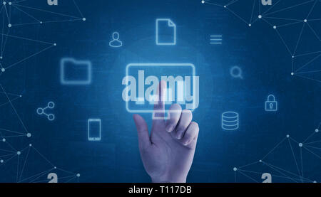 Hand touch computer icon surrounded with internet of things icons concept. Stock Photo