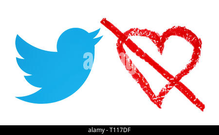 Kiev, Ukraine - December 19, 2018: Twitter bird with hand drawn red heart with oil pastel pencil. Twitter considers removing Like button Stock Photo
