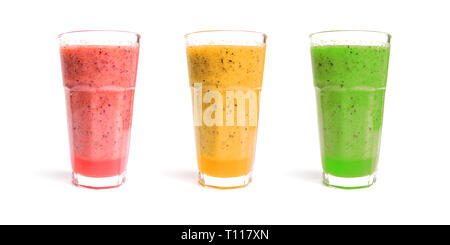 Fruit Smoothies in three Glasses isolated on white Background. Homemade fresh Pink, Yellow and Green Smoothie. Colorful healthy Smoothies. Stock Photo