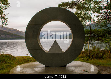 ROWARDENNAN, STIRLINGSHIRE, SCOTLAND, UK, SEPTEMBER 23, 2017: Low clouds are seen to roll in through the centre of the Rowardennan Memorial in the wet Stock Photo