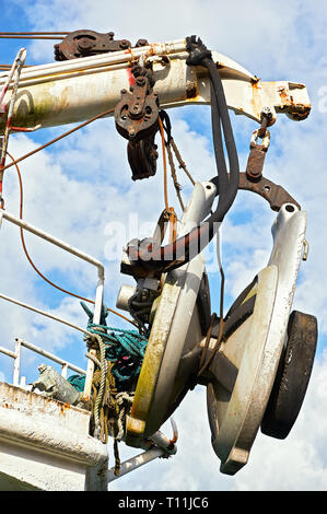 Close-up of pulley wheels with old ropes on an abandoned ship at Muelle Loney Port in Ilo-Ilo City, Philippines Stock Photo