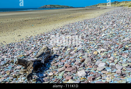 Rhossili Beach and Burry Holm on the Gower Coast, South Wales. All the Gower peninsula is an Area of Outstanding Natural Beauty, the first in the UK Stock Photo