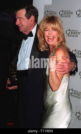 LOS ANGELES, CA. February 09, 1997: Actress Goldie Hawn with actor Walter Matthau at the American Comedy Awards. She presented him with the Lifetime Achievement Award for Comedy. Hawn starred with Matthau in 'Cactus Flower' for which she won an Oscar. Stock Photo