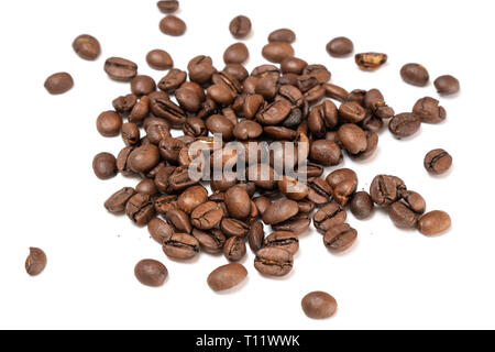 some coffee beans on a plain white table Stock Photo